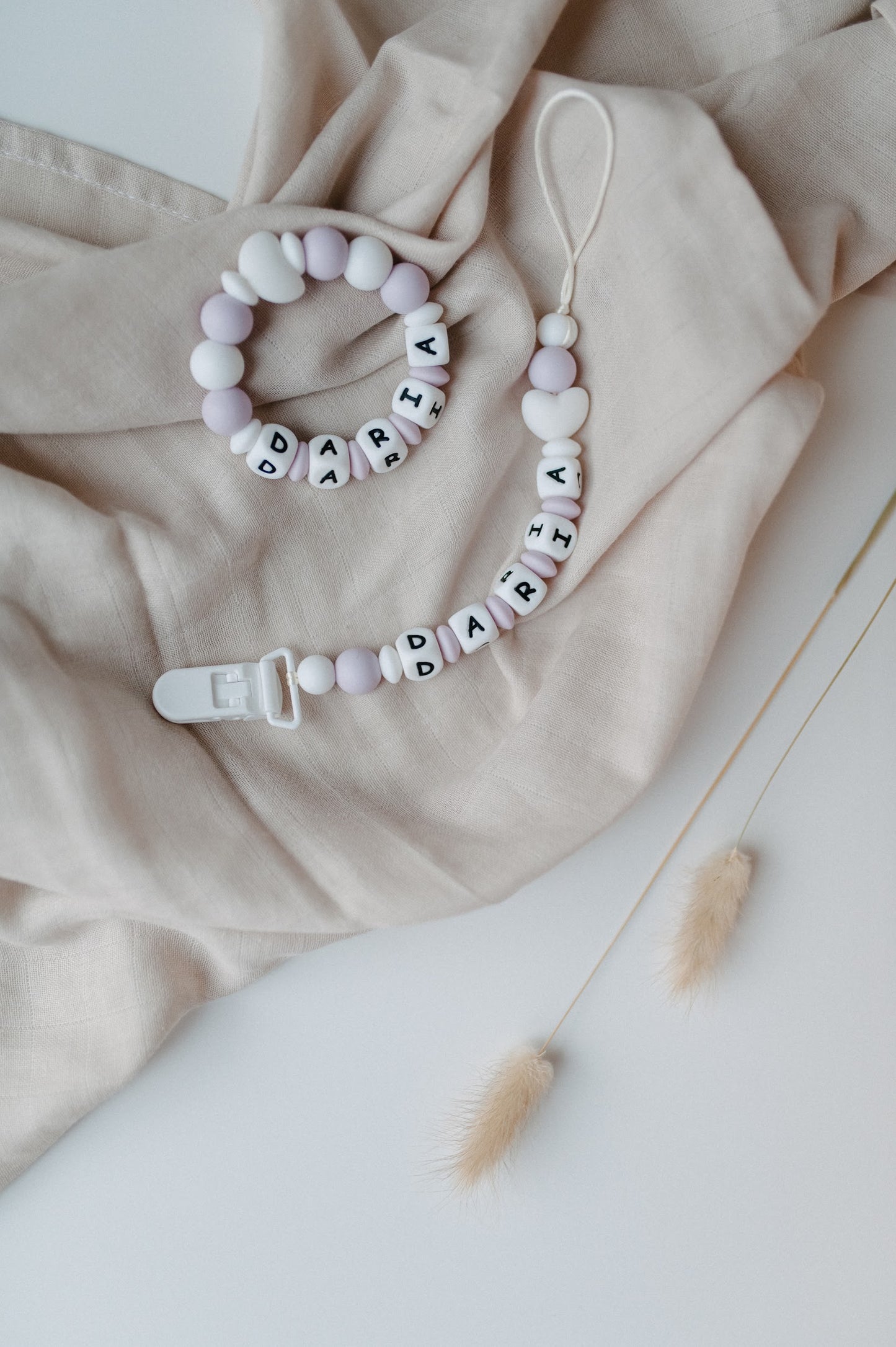 Personalized pacifier holder and personalized teething ring