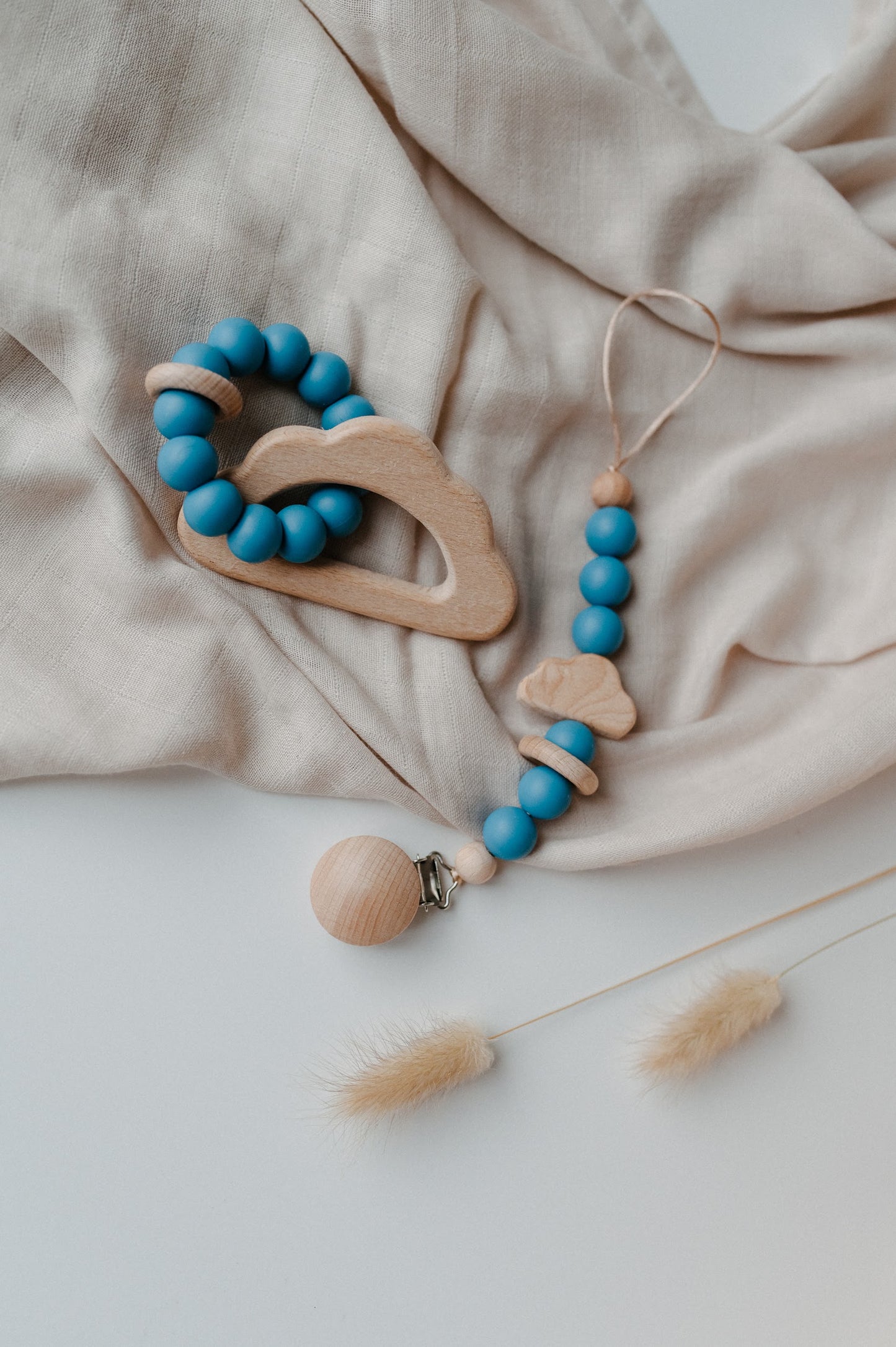 Pacifier holder and teething ring