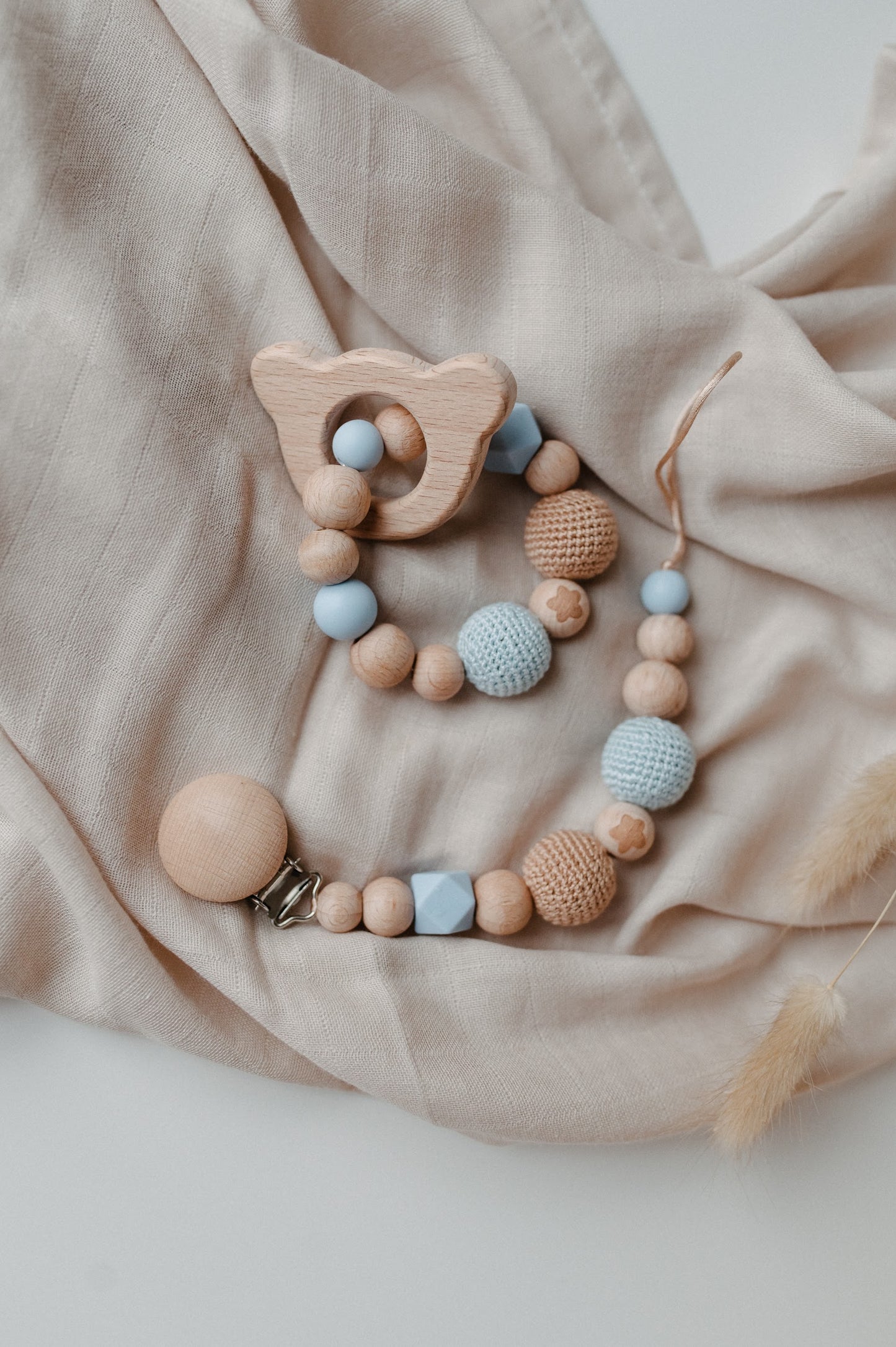 Pacifier holder and teething ring