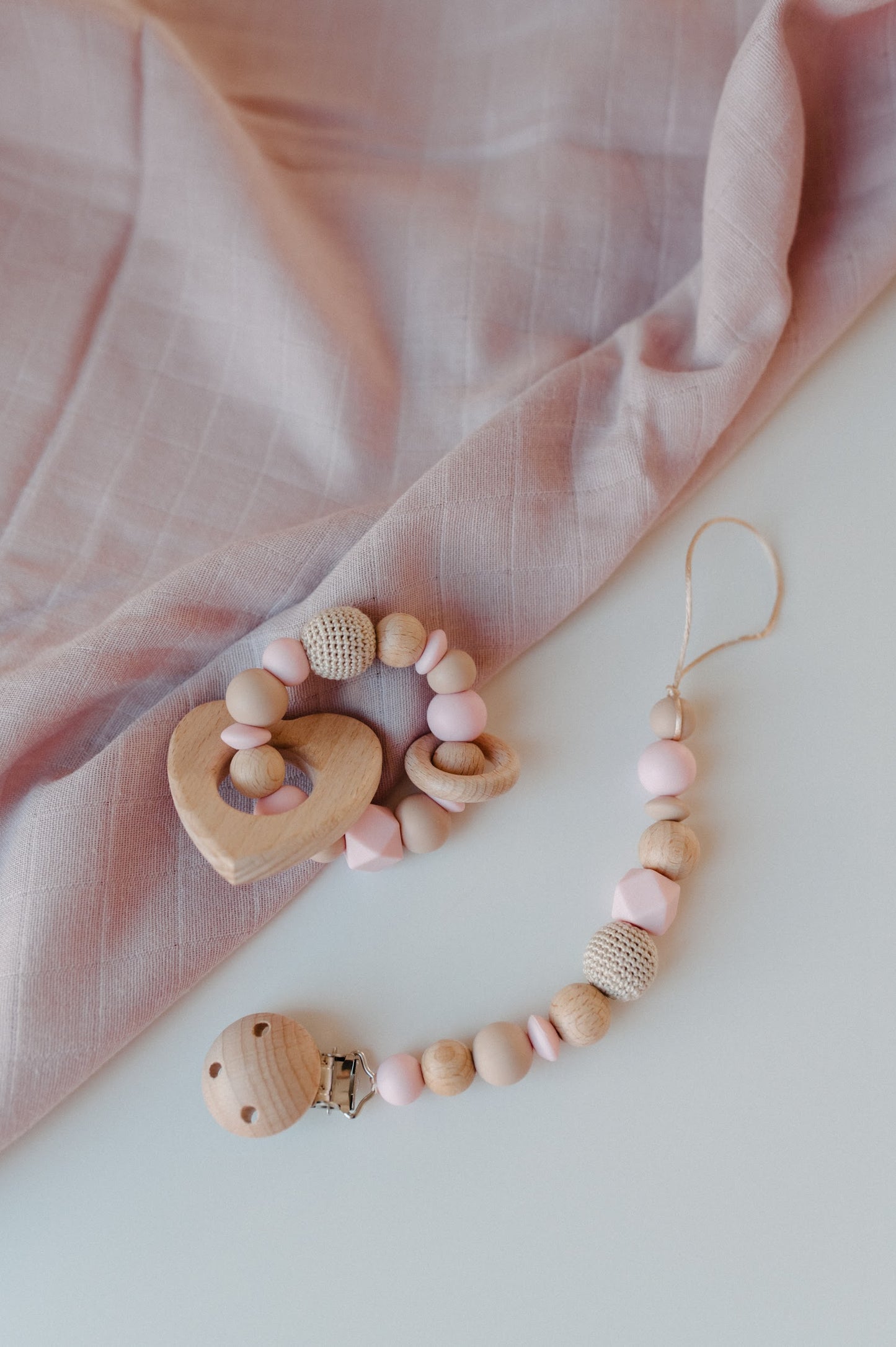 Pacifier holder and teething ring