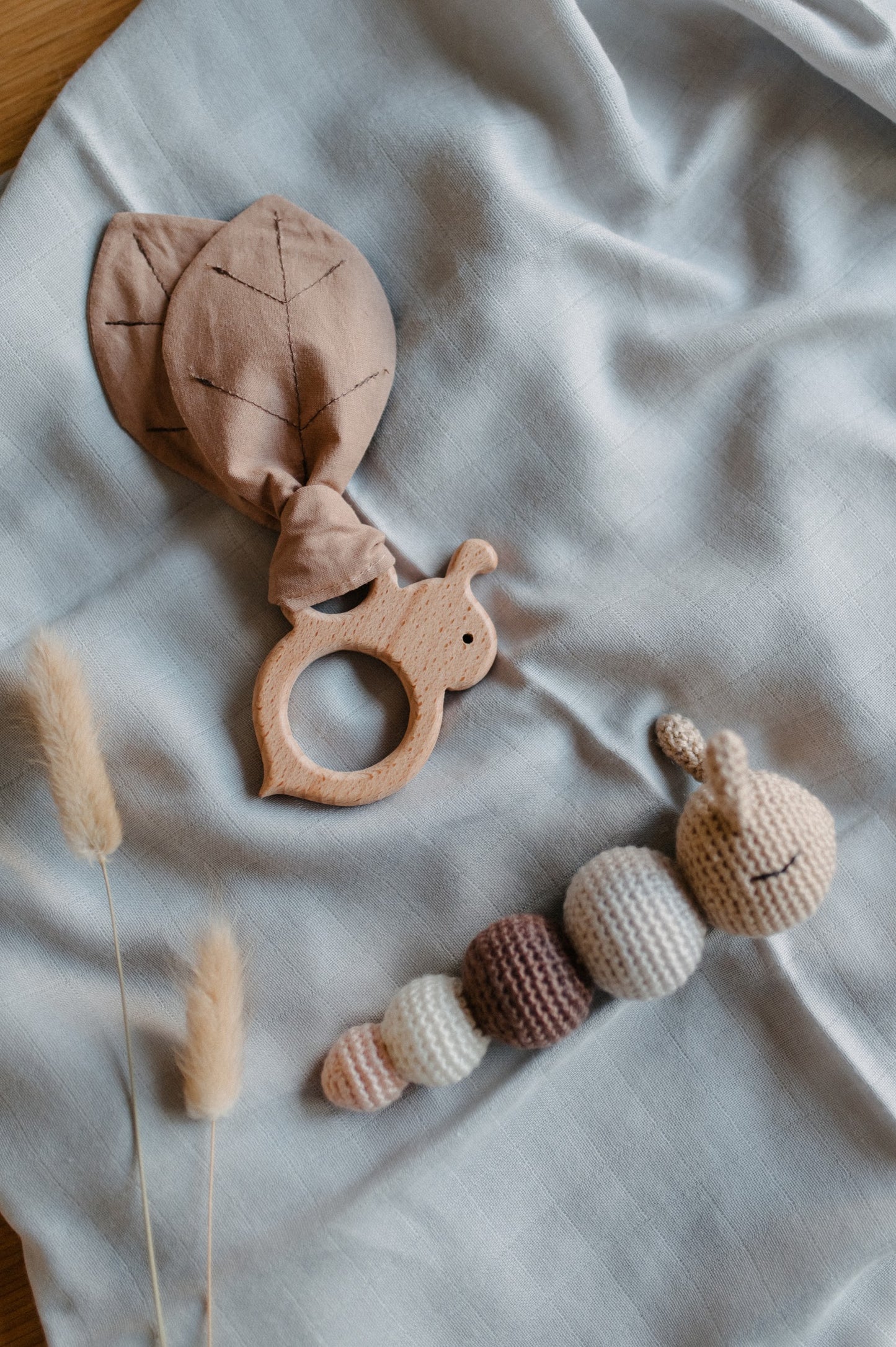 Crochet baby rattle "Caterpillar" and sensory toy "Crinkle bunny ears"