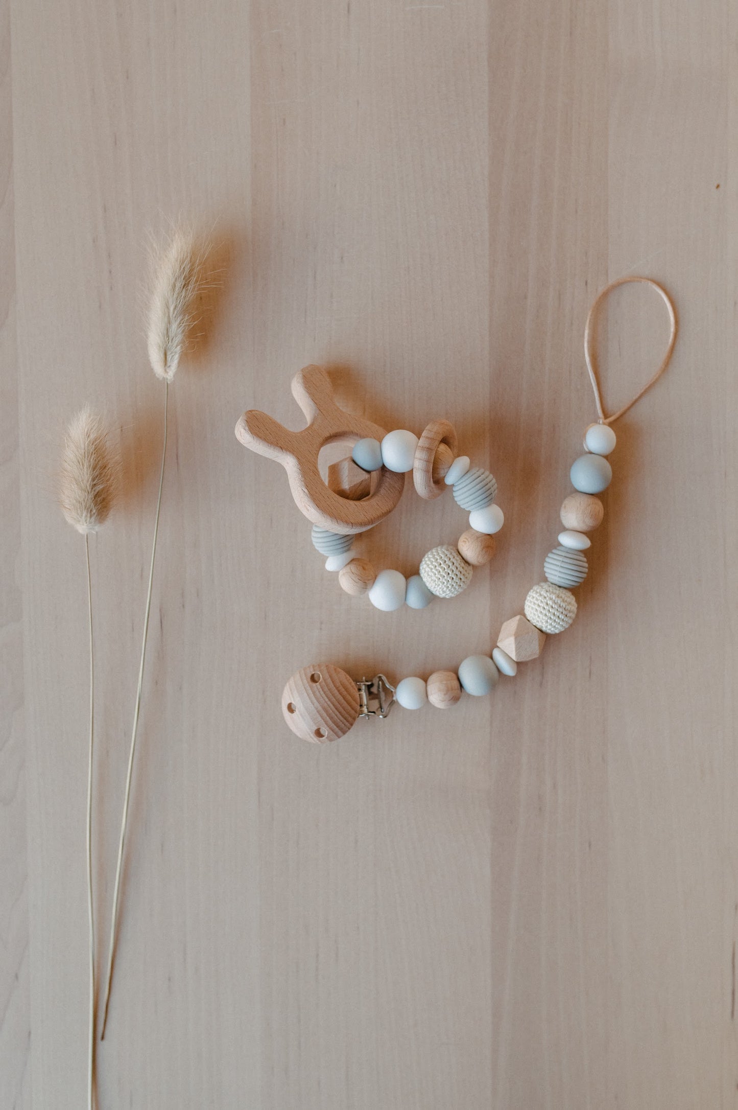 Pacifier holder and teething ring