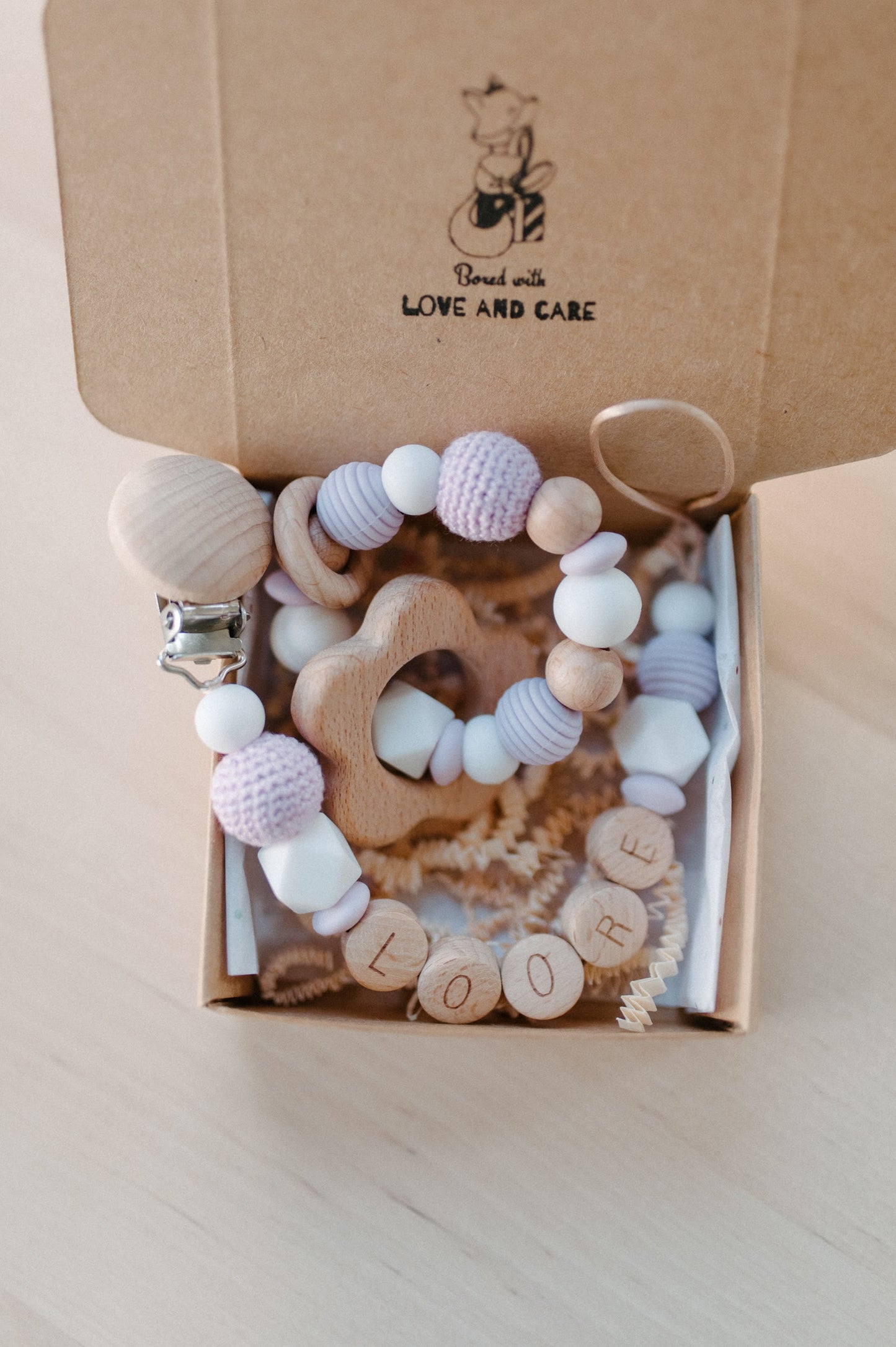 Personalized pacifier holder and teething ring