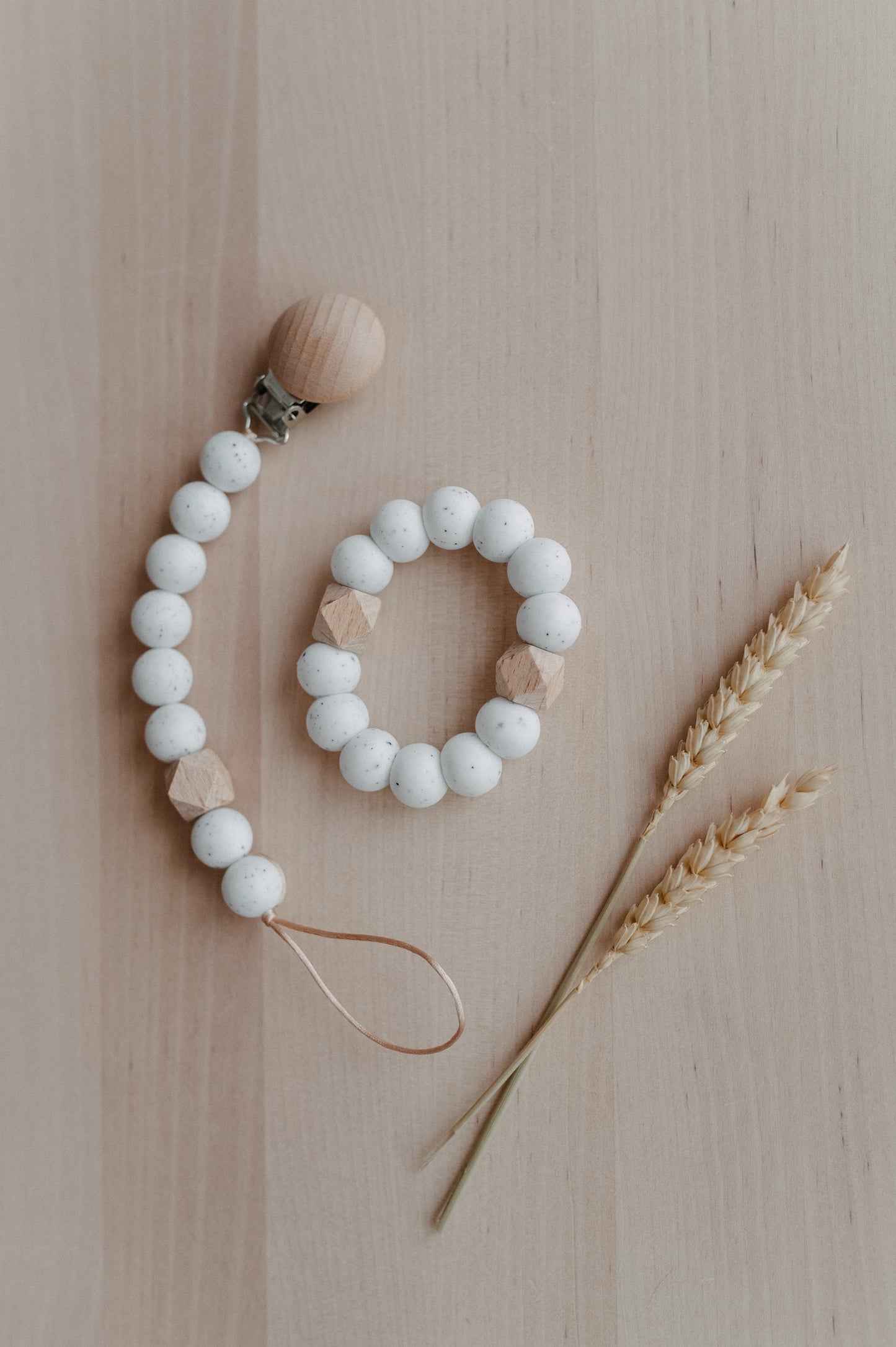 Pacifier holder and teething ring