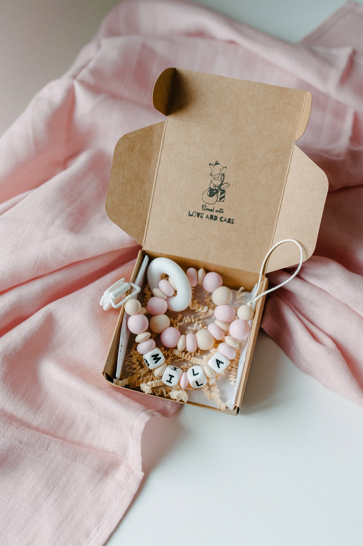 Personalized pacifier holder and teething ring