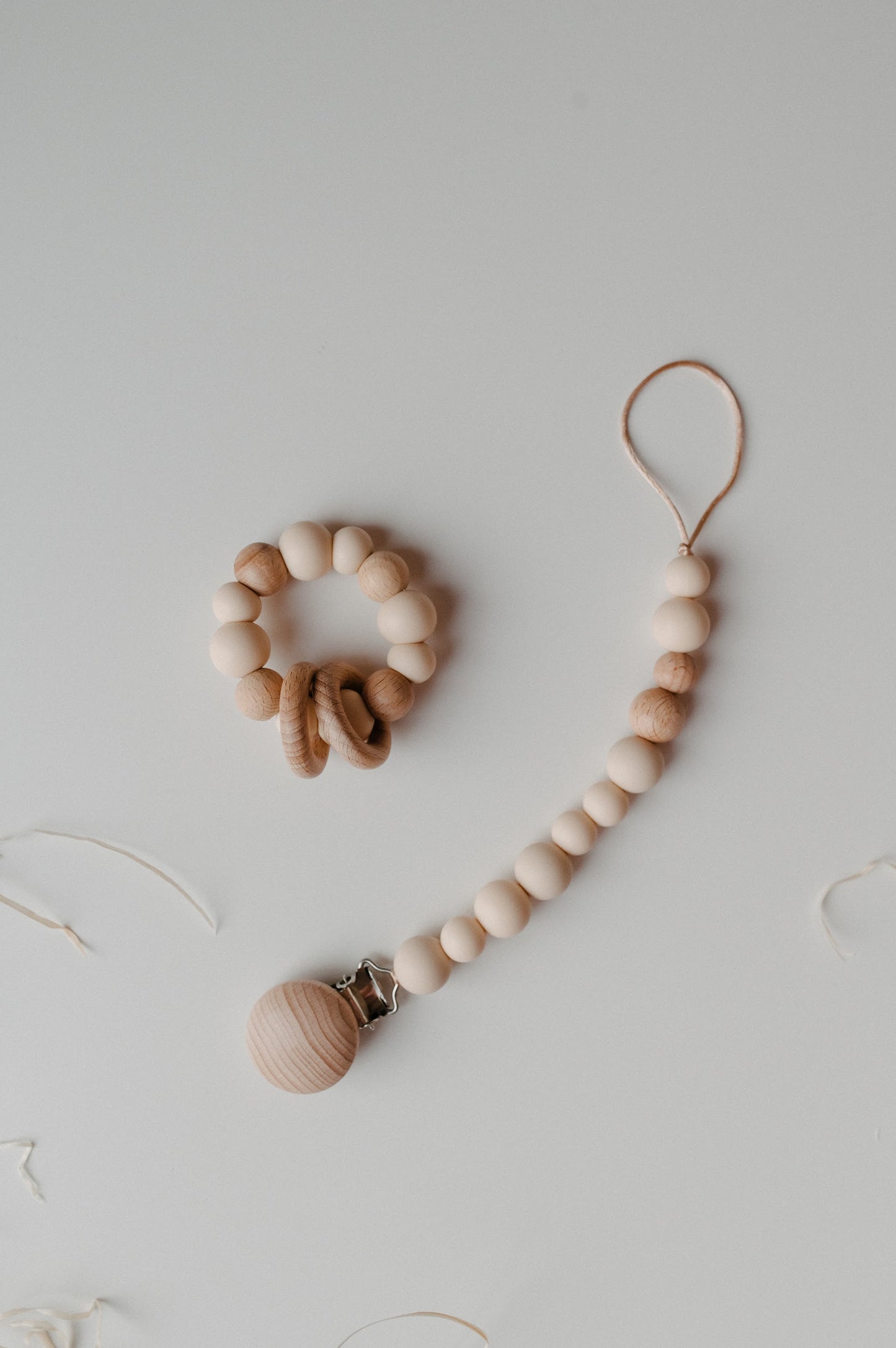 Pacifier holder and teething ring