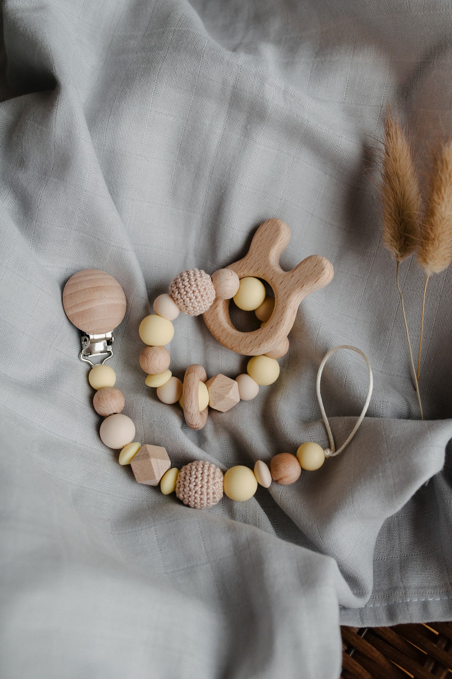 Pacifier holder and teething ring