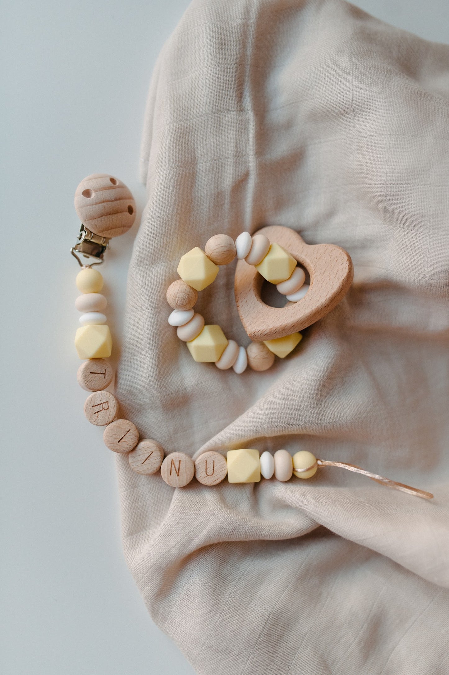 Personalized pacifier holder and teething ring