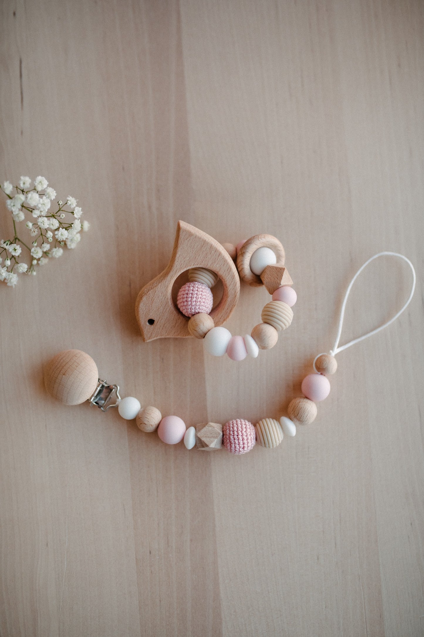 Pacifier holder and teething ring