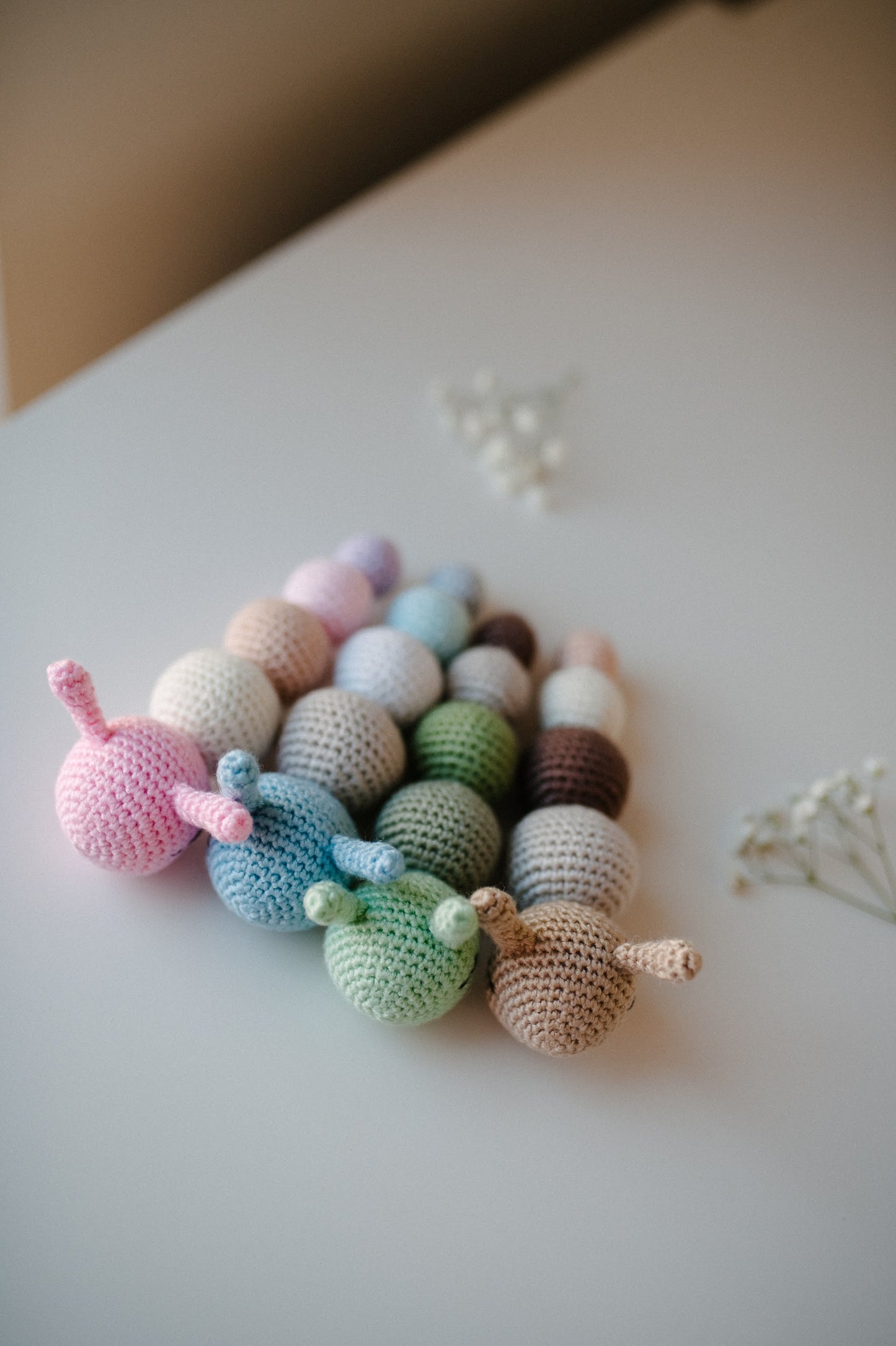 Crochet baby rattle "Caterpillar"