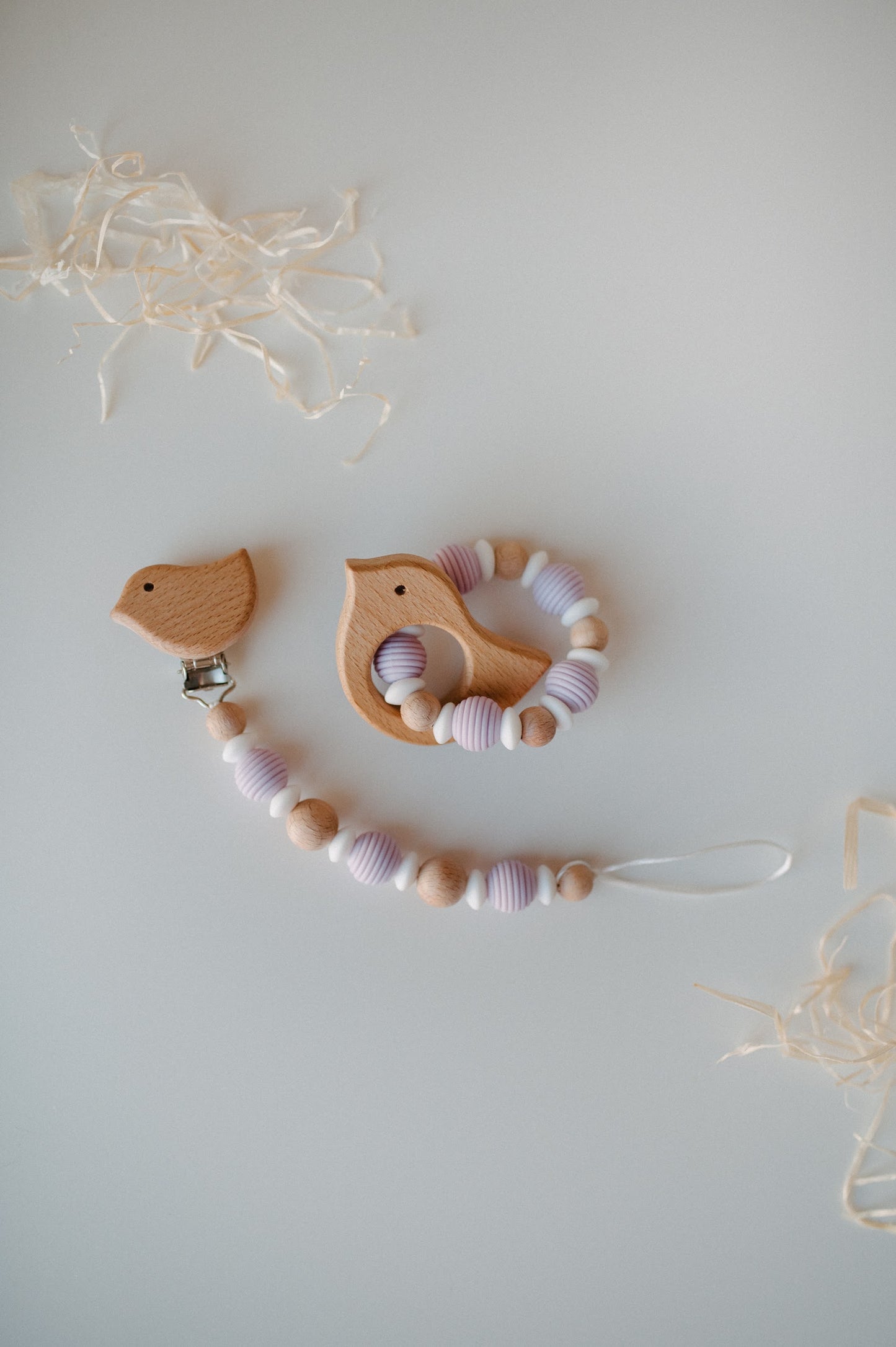Pacifier holder and teething ring