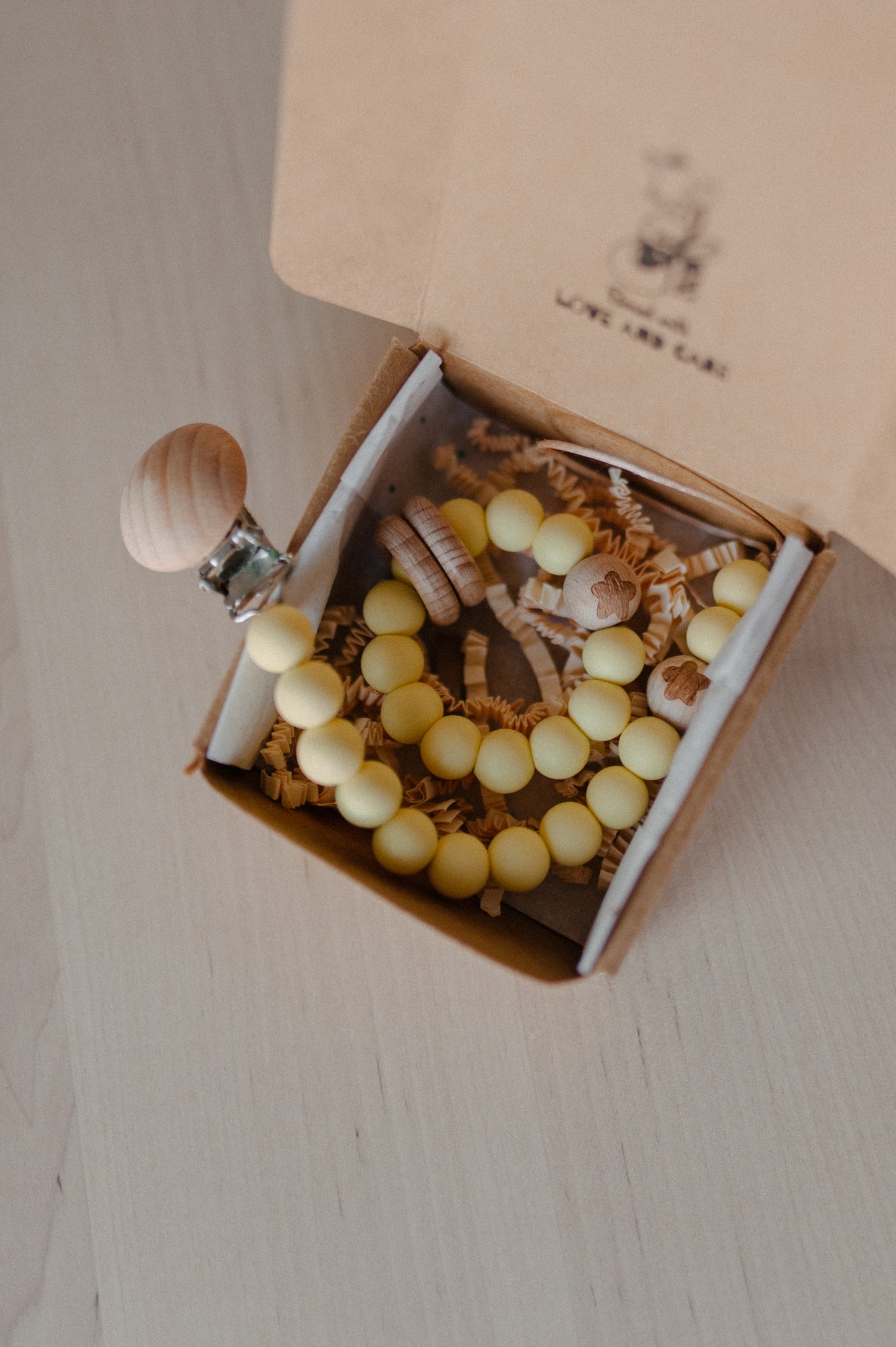 Pacifier holder and teething ring