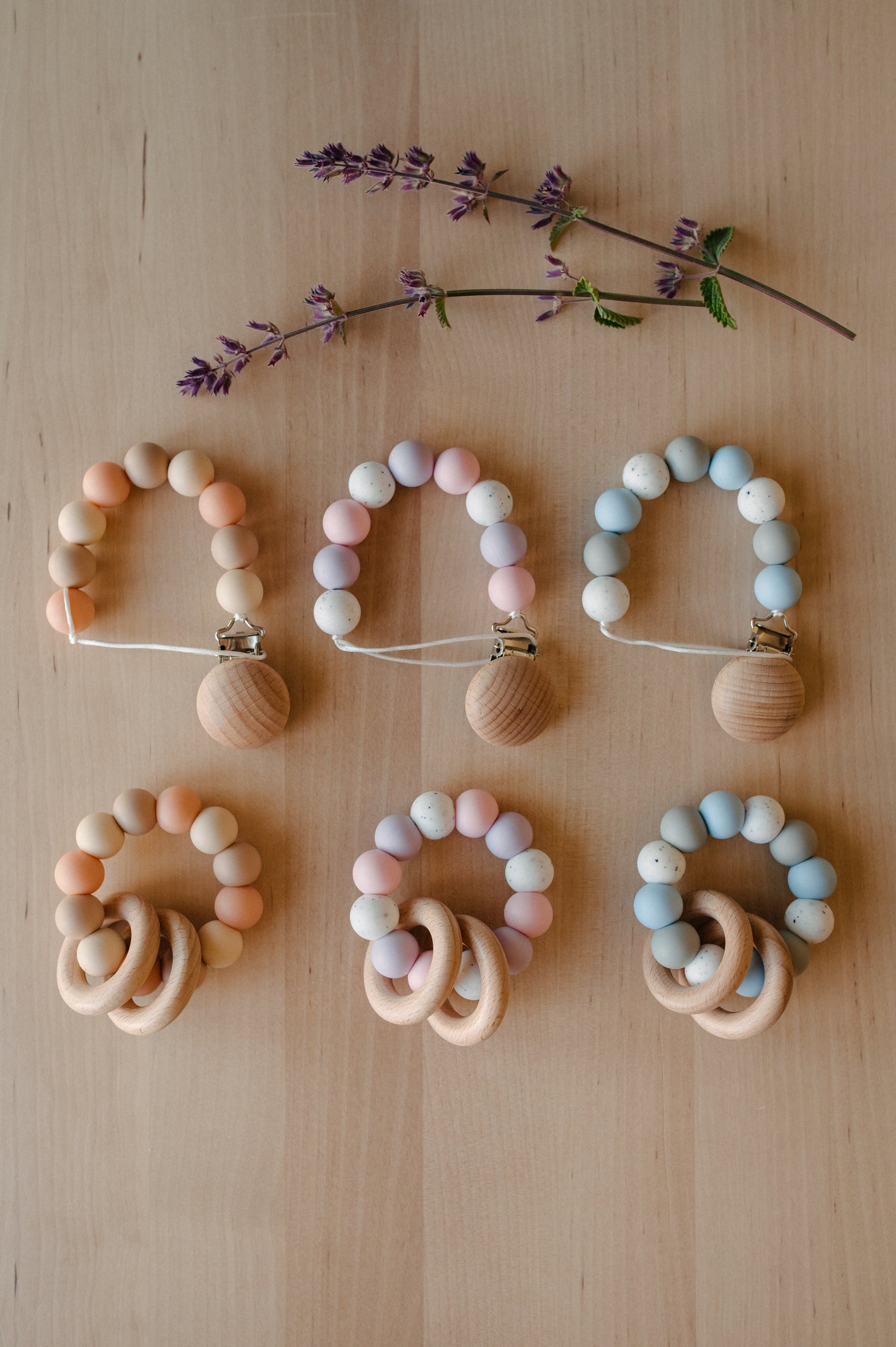 Pacifier holder and teething ring