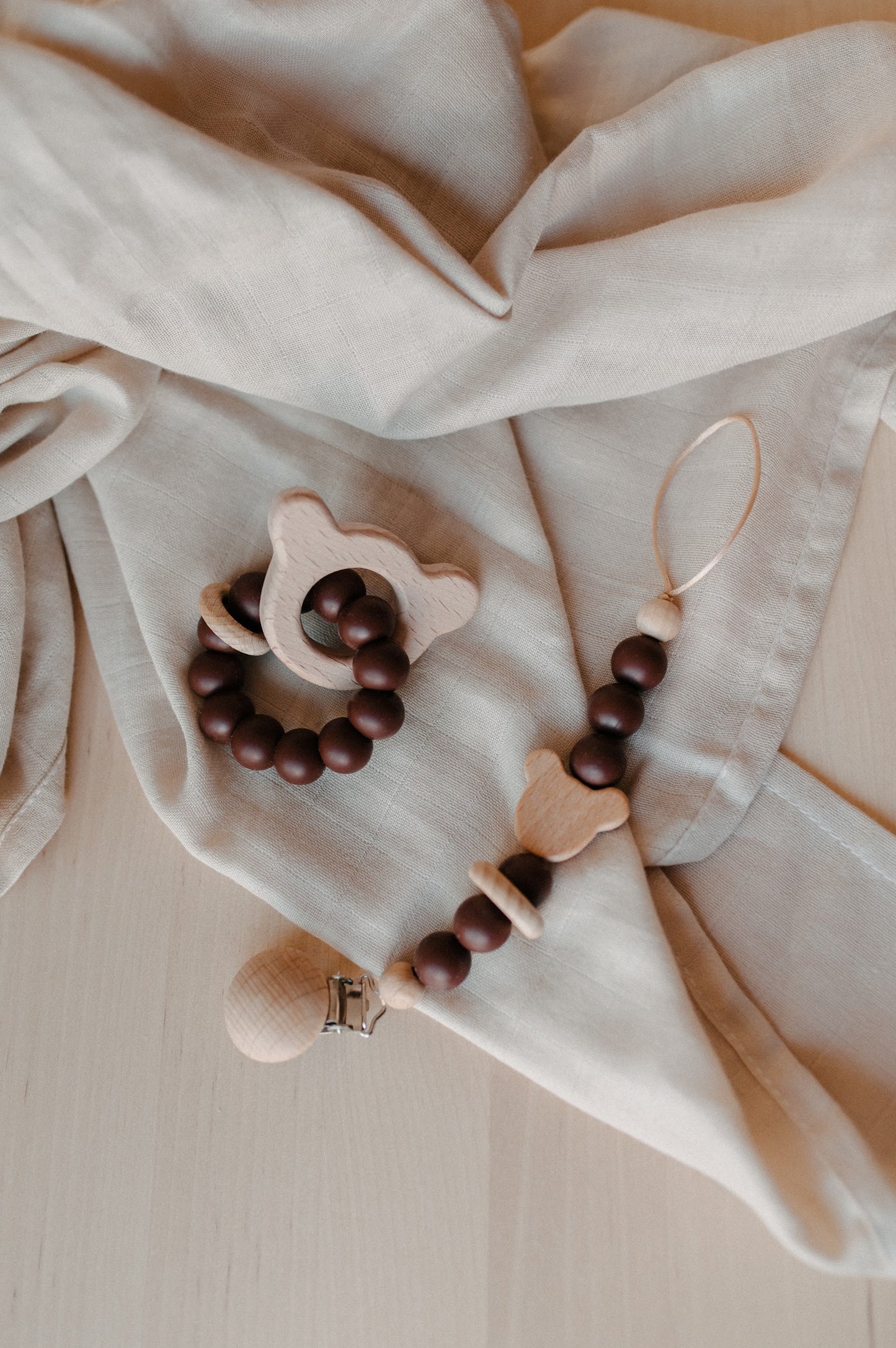Pacifier holder and teething ring