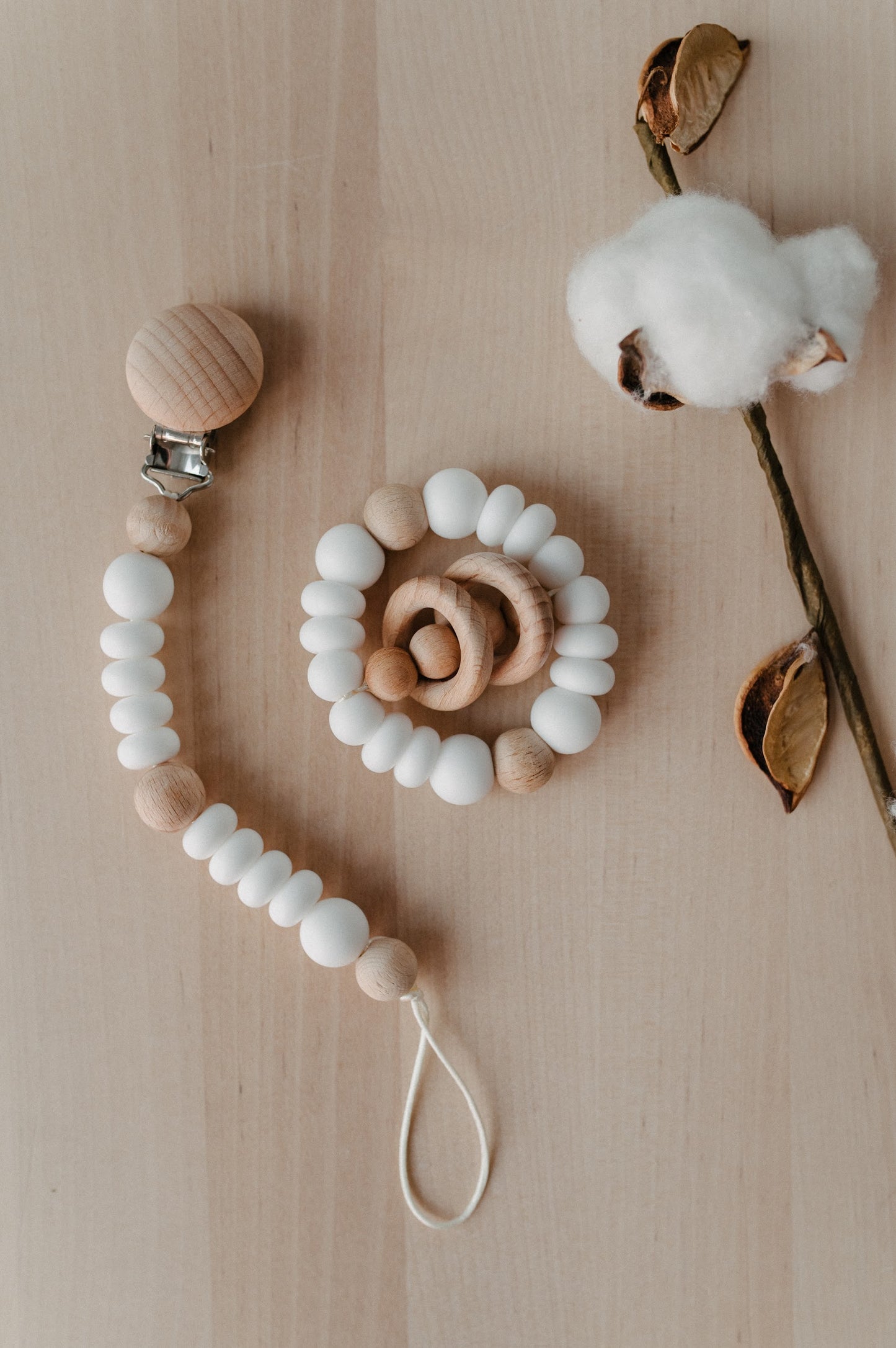 Pacifier holder and teething ring